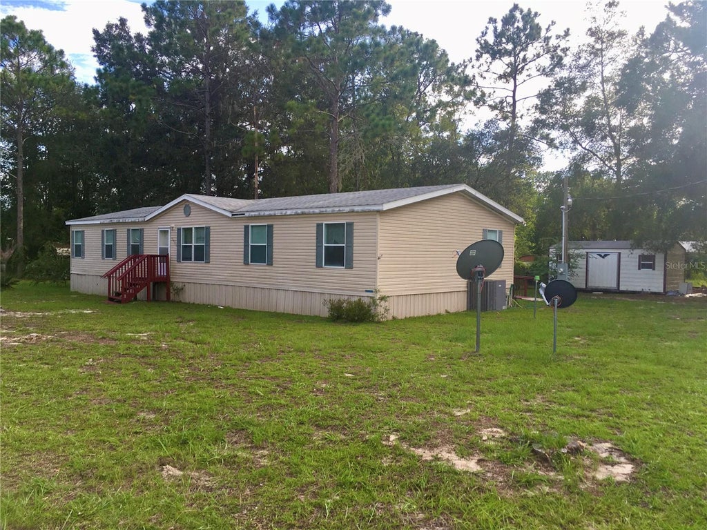 Photo of 5990 NE 101st Ave, Bronson, FL 32621 (MLS # GC543077)