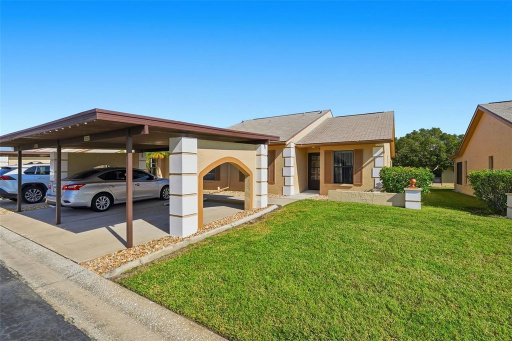 Photo of 4739 Sunny Loop #4739, Holiday, FL 34690 (MLS # TB8449269)