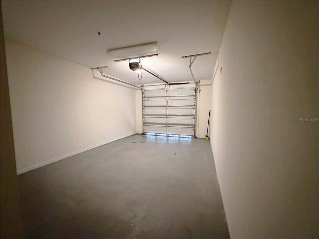 Photo of 12843 Madison Pointe Circle #201, Orlando, FL 32821 (MLS # O6429642)