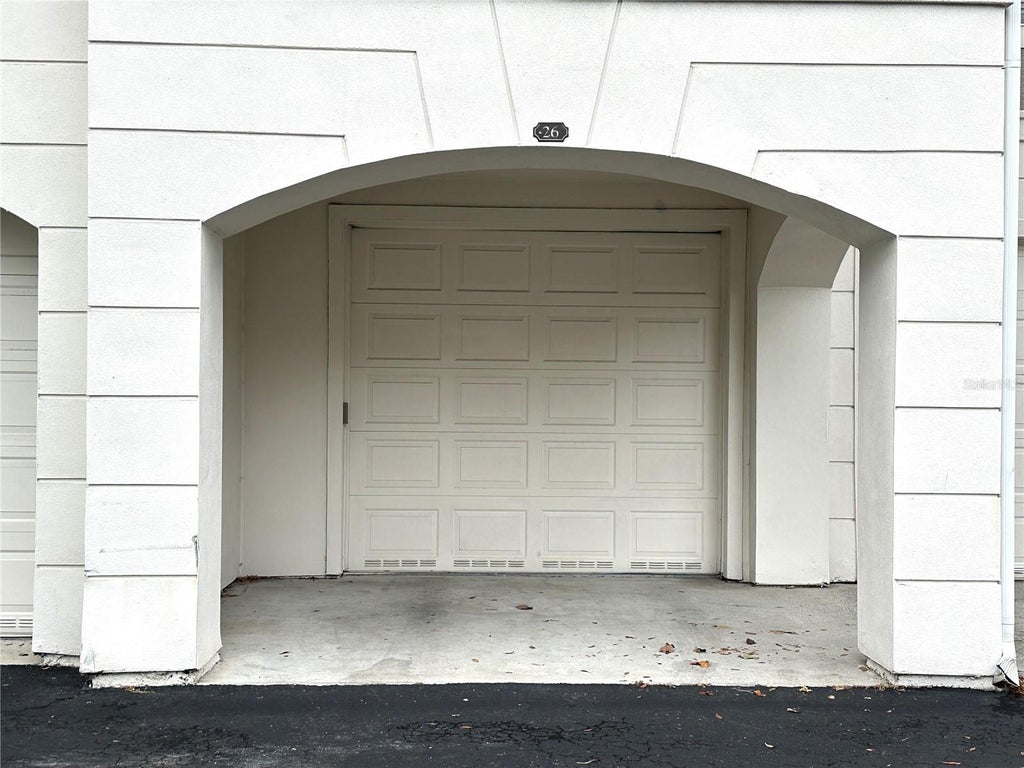 Photo of 12843 Madison Pointe Circle #201, Orlando, FL 32821 (MLS # O6429642)