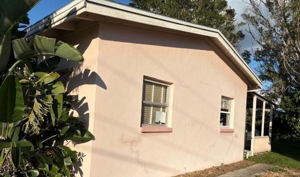 Photo of 125 Buckeye Avenue NW, Port Charlotte, FL 33952 (MLS # C7515561)
