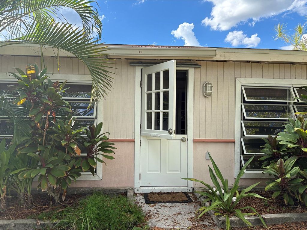 Photo of 125 Buckeye Avenue NW, Port Charlotte, FL 33952 (MLS # C7515561)