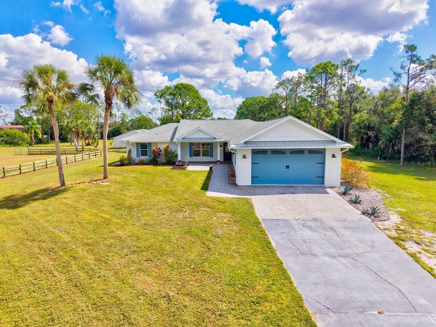 One or more photo(s) has been virtually staged. Welcome to 7131 Saddle Creek Circle | Sarasota, Florida - An Idyllic Florida Estate in a Premier Equestrian Community offering wide open spaces, grand pines, and plenty of room for horses - all within minutes of top-rated Sarasota schools, shopping, parks, and world-class beaches. Located in the highly sought-after gated equestrian community of Saddle Creek with over 25 miles of dedicated riding trails, this 5.31-acre property offers the privacy of a country retreat with the convenience of nearby city amenities.

Completely renovated and expanded in 2020, this move-in-ready ranch-style home blends timeless charm with modern finishes. A welcoming covered front porch opens to a bright, open-concept living area featuring vaulted ceilings and elegant porcelain plank tile throughout. The stylish kitchen showcases white cabinetry with soft-close drawers, striking granite countertops, a new tile backsplash, and a spacious island ideal for entertaining.

The adjacent dining room, with one of two new impact glass sliders, opens to the covered lanai and expansive paver pool deck, perfect for relaxing or hosting gatherings. The primary suite, tucked privately beyond the dining room, features a spa-inspired bath, a generous walk-in closet, and serene views of the pool and backyard. The desirable split floor plan includes three guest bedrooms and a full guest bath, ensuring comfort and privacy for family or guests. A versatile 20' x 16' bonus room with a half bath and direct access to the two-car garage offers endless possibilities as a home office, movie room, or creative studio. A spacious laundry room is located just off the kitchen offering space to add custom pantry storage. 

Enjoy peace of mind knowing this property sits high and dry in an X flood zone and features all impact glass sliders and doors, many impact glass windows, a dedicated generator plug, and an optional 25kW diesel generator capable of powering the entire home. The attached two-car garage is extra-long at 28’ deep and features an 8’ tall impact-rated garage door. Outdoors, the acreage is fenced with split-rail fencing, mature pines, dry pasture, and a small pond. The property includes a two-stall barn offering a fantastic opportunity for restoration or customization to suit your needs. With a little vision and investment, this structure can be transformed into the perfect home for your horses or reimagined as a workshop, studio, or storage space.

Important updates include a new roof, AC system, and water heater in 2019, a new pool cage in 2023, and a new well & well pump, septic tank, impact glass window, two impact glass sliders, river rock landscaping, kitchen backsplash, refrigerator, dishwasher, and pool pump in 2025.

Saddle Creek is a picturesque, gated community of 170 homes, each on 5+ acre parcels, offering space, serenity, and over 25 miles of riding trails - just minutes from the cultural sophistication and natural beauty that define Sarasota. 7131 Saddle Creek Circle perfectly captures the essence of Florida country living with modern comfort, elegance, and privacy.