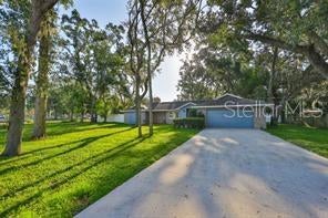 Photo of 102 Cash Drive, Seffner, FL 33584 (MLS # TB8500712)