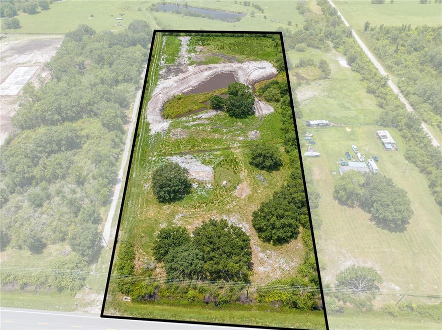 Bring your builder, your boots, and your blueprints — this 6.59-acre gem is the golden ticket to your dream home or next smart investment. With over 265 feet of paved road frontage, access is easy, visibility is prime, and the options? Endless. Tucked in a peaceful yet super-convenient location just minutes to Melbourne and the beaches, you'll enjoy the best of both worlds: wide-open space and coastal convenience. Picture sipping coffee by your own private pond, watching the sunrise, and knowing your nearest neighbor is far enough away to keep the peace. And here's the kicker: this property comes with a FULL IMPACT FEE CREDIT — a $37,000 value already handled. That’s money back in your pocket and one less hurdle on your way to building. No HOA. No timeline to build. Just land that’s flat, beautiful, and ready for action, Its Cleared has a Credit And is calling your name. Let’s meet for you private showing! — this one won’t last