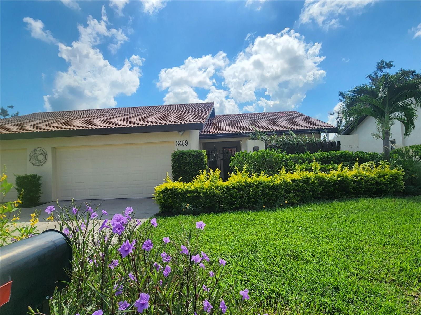 Beautiful Villa centrally located in Sarasota. The community of Village Plaza is a 55+ maintenance free community that rarely has a rental available. Enter through a private gate that leads to an open patio. The open floor plan offers upgrades throughout including NEW plumbing through attic, tankless water heater, Bluetooth speaker in the master bath. The vaulted ceilings, expansive living dining areas, open kitchen and Florida room is a great use of space and makes the unit feel very large. Custom kitchen has two toned cabinets, upgraded stainless steel appliances and extended granite countertops. Additional cabinets under the counter provide extra storage. Master bedroom has French doors, double customized closets leading to the master bath which boasts walk in shower and dual sinks. Inside laundry leads to 2 car garage with outside storage cabinets, hurricane shutters and new garage door. The spilt plan adds extra privacy when you have guests. Cable TV is included in the rent. Amenities include: heated pool, sauna, clubhouse, fitness center, billiards room, library, pickleball courts. You can join the social events at Village Plaza. Only minutes to Siesta Beach, Downtown, shopping and some of Sarasota’s finest restaurants!