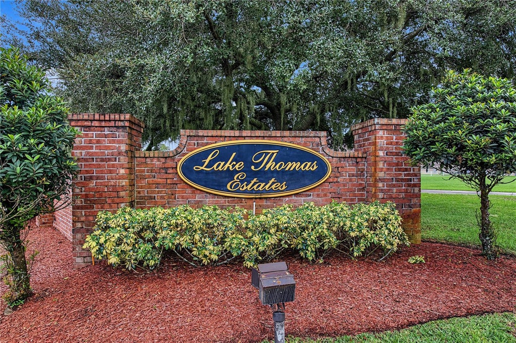 Photo of 915 Lake Thomas Lane, Lutz, FL 33548 (MLS # TB8557142)