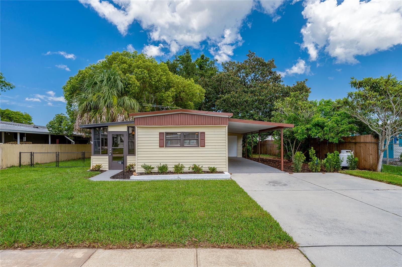 Port Orange Home! Charming 2 bedroom, 2 bathroom home with a versatile bonus room that can be used as a third bedroom, home office, or den - tailor it to fit your lifestyle. You own the land. The freshly painted exterior and upgraded landscaping add charming curb appeal. Step inside to discover an open-concept floor plan filled with natural light and finished with tile flooring throughout. The spacious living room area flows seamlessly into a large Florida room, showcasing wall-to-wall windows that invite the outdoors in and provide the perfect spot to relax or entertain. You'll love the oversized screened porch, great for enjoying warm Florida evenings in comfort and privacy. The generous primary suite includes a remodeled ensuite bath with a double sink vanity and a large walk-in shower.. Fantastic location in the heart of Port Orange with an amazing school zone. Just minutes to the intracoastal, beach, dining, shopping and entertainment. Don't miss the opportunity to make this home your own! All information recorded in the MLS is intended to be accurate but cannot be guaranteed.