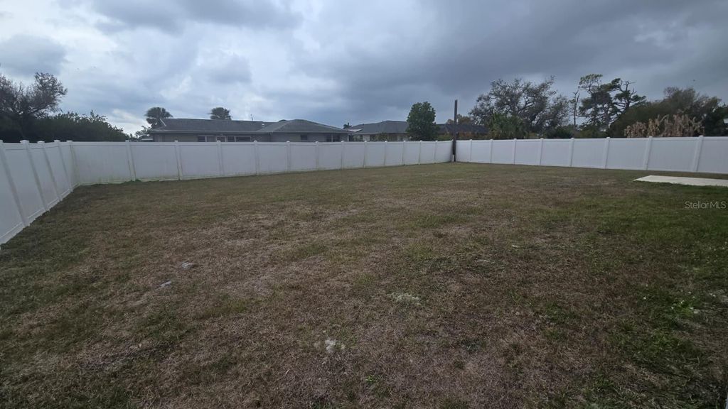 Photo of 22441 Oceanside Avenue, Port Charlotte, FL 33952 (MLS # TB8484023)