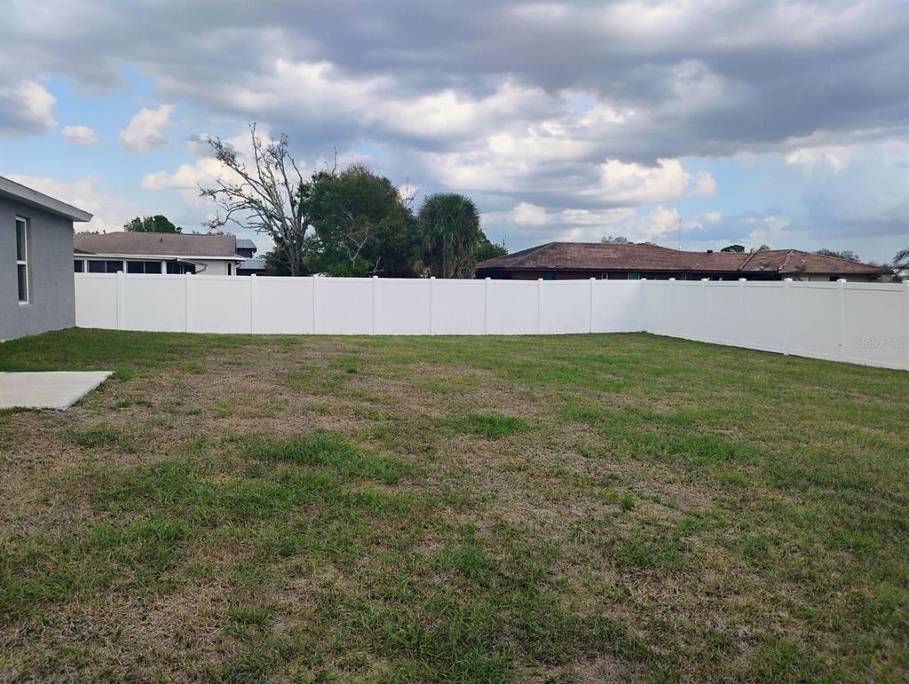 Photo of 22441 Oceanside Avenue, Port Charlotte, FL 33952 (MLS # TB8484023)