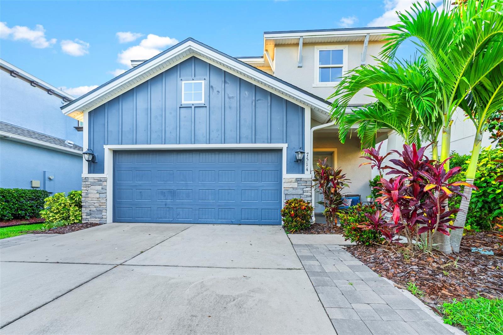 Fall in love with this stunning 4 bedroom 3.5 bath, David Weekly POOL home…did I mention it has a NEW ROOF with transferable Owens Corning Warranty. The moment you walk in you see the tranquil view of the pool and waterfall from the wall to wall multipanel sliders. The Redwing model built in 2017, offers the perfect blend of luxury, comfort, and functionality. This home features soaring high ceilings, abundant natural light, and NO carpet throughout. The layout offers a thoughtful floorplan with a second floor guest bedroom with a full en suite bathroom, a second floor loft large enough for office or rec space, and a FIRST floor Owner’s Suite. The owner’s suite overlooks the pool, 10ft ceilings, tray ceiling, crown molding, and beautiful custom built closet and soaking tub!!!! Upstairs all bedrooms are spacious! Inside upgrades include: Gourmet Kitchen, Granite Counters, Gas Cooktop, Stainless steel appliances, water treatment system, tankless GAS water heater, and a custom built LED Fireplace accent wall in the living area. This home has been pre-wired for indoor/outdoor speakers. My favorite part of this home is the outdoor living space perfect for living your best Florida life!!! Step out to your backyard Oasis featuring a heated saltwater pool with multicolored LED lighting, waterfall, sun shelf, and hot tub! You will enjoy the mature tropical landscaping, fully equipped outdoor kitchen with stainless steel fridge, garbage can, and granite countertops. Sit back in the hammocks, take a dip, and feel at home! Located in the highly desirable Waterset community, known for its resort style amenities and great community events! You will love the amenities: multiple pools including a slide pool, multiple gyms, parks, trails, basketball, tennis, PICKLEBALL, volleyball, splash pad, dog parks, and nature galore!!! Only 20 miles from downtown Tampa, don’t wait to make this home yours today!!!