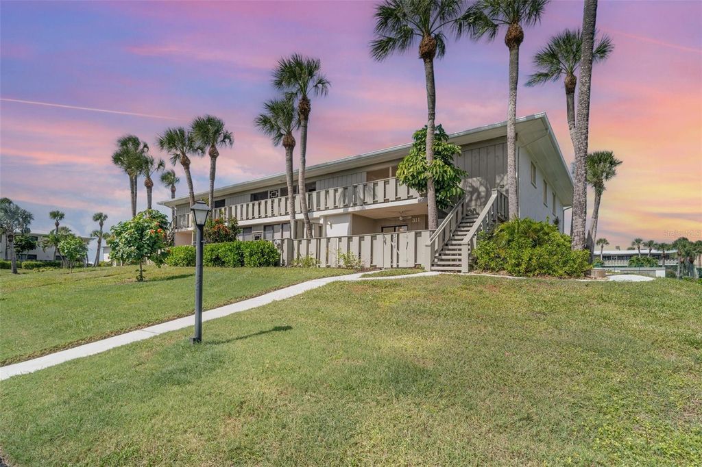 Photo of 6200 Flotilla Drive #311, Holmes Beach, FL 34217 (MLS # A4667378)
