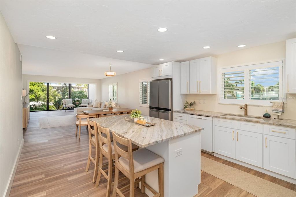 Photo of 6200 Flotilla Drive #311, Holmes Beach, FL 34217 (MLS # A4667378)