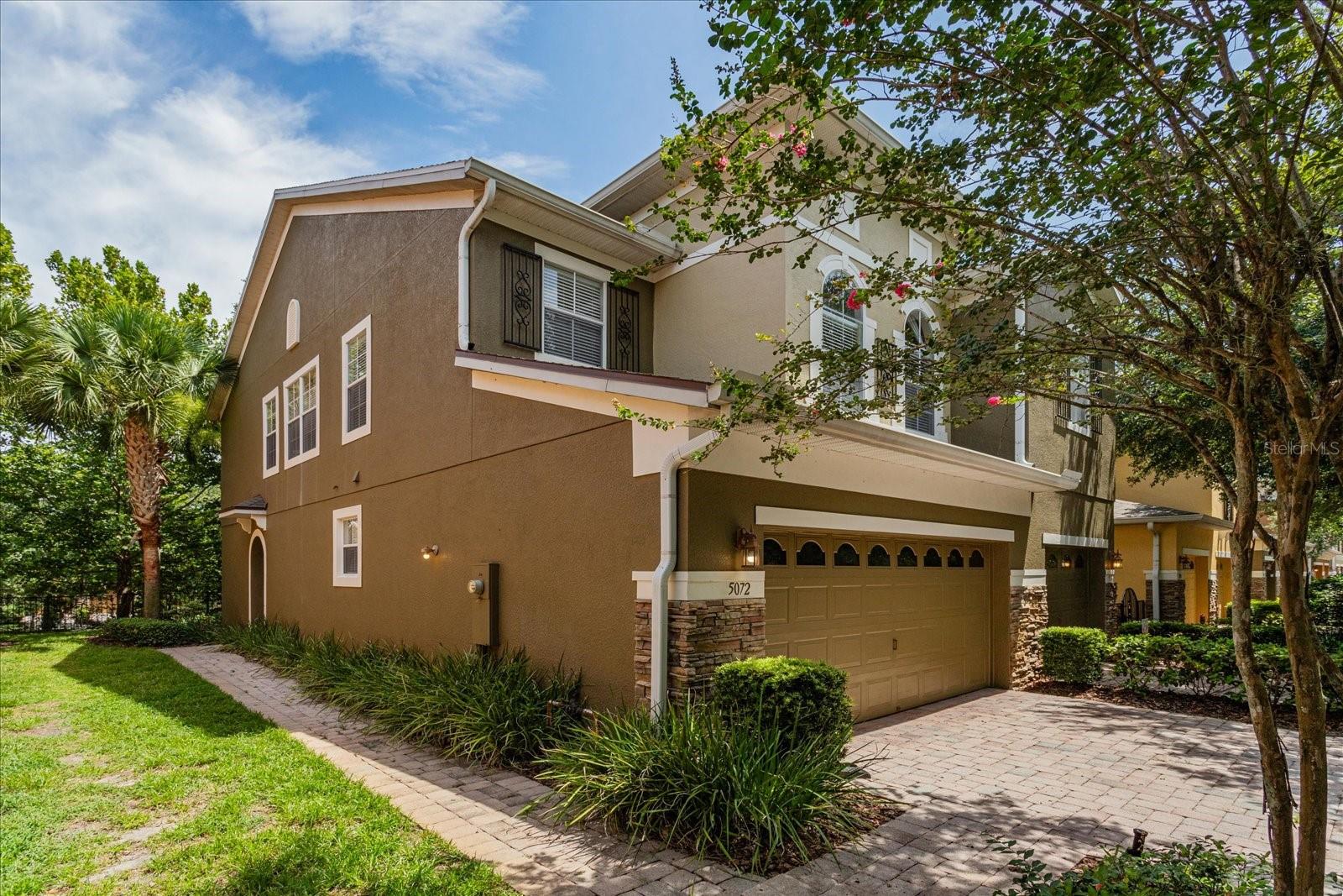 Welcome to 5072 Cypress Branch Point, located in the desirable gated community of Clayton Crossings in Oviedo. This well-maintained corner end unit townhome offers 3 bedrooms and 2.5 bathrooms and boasts over 1650 square feet of living space. Step inside to find a bright and airy floor plan featuring a beautiful kitchen with granite countertops, 42” cabinets, recessed lighting, and stainless steel whirlpool appliances. The living room/dining room combo opens up off the kitchen and offers tile flooring and sliding glass doors that give you access to the back patio. On the 2nd level, you’ll find the primary suite complete with tray ceilings, a large walk-in closet, and a spa-like bathroom with dual vanities, a soaking tub, and a separate walk-in shower. The 2 additional bedrooms are ideally situated on the opposite side of the primary suite near the guest bathroom, complete with a shower and tub combo. Additional highlights include upstairs laundry, an attached 2-car garage, updated AC/thermostat (2022), and a newer Whirlpool fridge (2024). The community of Clayton Crossing also has an upgraded resort-style community pool and takes care of all the yard and exterior maintenance for the residents. This home is conveniently located just minutes from SR417, 408, UCF, Valencia College, and the Cross-Country Seminole Trail. Don't miss your chance to enjoy maintenance-free living and make this beautiful house your new home!