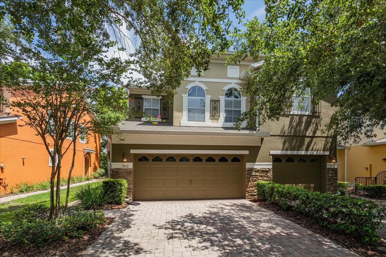 Welcome to 5072 Cypress Branch Point, located in the desirable gated community of Clayton Crossings in Oviedo. This well-maintained corner end unit townhome offers 3 bedrooms and 2.5 bathrooms and boasts over 1650 square feet of living space. Step inside to find a bright and airy floor plan featuring a beautiful kitchen with granite countertops, 42” cabinets, recessed lighting, and stainless steel whirlpool appliances. The living room/dining room combo opens up off the kitchen and offers tile flooring and sliding glass doors that give you access to the back patio. On the 2nd level, you’ll find the primary suite complete with tray ceilings, a large walk-in closet, and a spa-like bathroom with dual vanities, a soaking tub, and a separate walk-in shower. The 2 additional bedrooms are ideally situated on the opposite side of the primary suite near the guest bathroom, complete with a shower and tub combo. Additional highlights include upstairs laundry, an attached 2-car garage, updated AC/thermostat (2022), and a newer Whirlpool fridge (2024). The community of Clayton Crossing also has an upgraded resort-style community pool and takes care of all the yard and exterior maintenance for the residents. This home is conveniently located just minutes from SR417, 408, UCF, Valencia College, and the Cross-Country Seminole Trail. Don't miss your chance to enjoy maintenance-free living and make this beautiful house your new home!