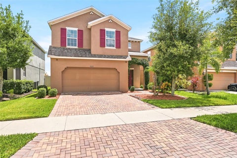 Photo of 10229 Newminster Loop, Ruskin, FL 33573 (MLS # TB8537632)