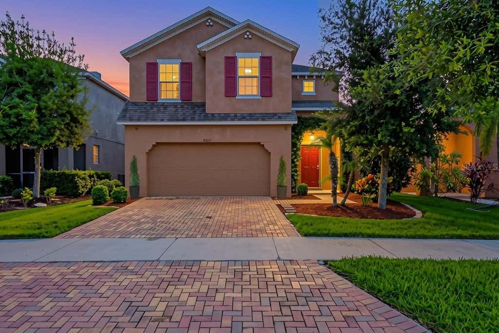 Photo of 10229 Newminster Loop, Ruskin, FL 33573 (MLS # TB8537632)