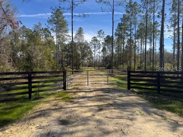 This rare Florida Treasures in tucked in to the live oaks and spring hammocks of Marion County. It's not often that you find a parcel this large that borders state conservation land. The property is loaded with with whitetail deer and Osceola Turkey, it is an outdoor enthusiasts dream find! Property Just recently got approval for an AG Lot Split and features 6 separate lots.