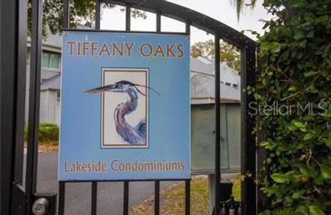 Photo of 9726 Tiffany Oaks Lane #9726, Tampa, FL 33612 (MLS # TB8512139)