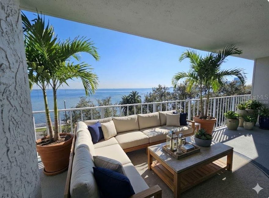 One or more photo(s) has been virtually staged. Waterfront Luxury at The Bayshore Diplomat | Zoned for Mitchell, Wilson, & Plant
Experience the iconic South Tampa lifestyle in one of the best located condos directly on Bayshore Blvd. This expansive, nearly 1,600 sq. ft. corner residence is perched on a high floor of the prestigious Bayshore Diplomat, offering breathtaking, panoramic views of Hillsborough Bay, Downtown Tampa, Davis Islands, and the bay beyond. Join the vibrant local community in walking, jogging, and taking in the views along the harbor right outside your door.
The interior has been thoughtfully modernized, featuring a renovated kitchen and primary bathroom. The open floor plan is designed for seamless transitions between the kitchen, living, and dining areas, all tied together by stylish wood-look tile flooring that runs throughout the entire unit. Storage is exceptional here, including an expansive walk-in pantry, walk-in closets in both bedrooms, and multiple linen/storage closets.
Modern convenience is at your fingertips with high-end window treatments tailored for comfort. The primary suite serves as a true retreat, featuring interior shutters and remote-controlled electric blackout shades. The living area is equally equipped with motorized shades for effortless light management. Both bedrooms are generously sized—with the primary facing the harbor for gorgeous sunrise views, while the second bedroom also boasts water views. Beyond the interior, a private wraparound balcony provides an incredible vantage point to watch dolphins in the bay or enjoy the cooling coastal breeze.
Living at The Bayshore Diplomat places you directly on the world-famous Bayshore Boulevard, the longest continuous waterfront promenade in the U.S. This celebrated path offers a direct route for exercise or leisure to Downtown Tampa and is the heart of Tampa’s most cherished traditions, including Gasparilla. Residents enjoy a full-service lifestyle with 24-hour security, on-site management, and premium amenities including a heated community pool, tennis courts, and newly added pickleball courts.
Leasing Details:
This exceptional rental includes cable TV, high-speed internet, water, sewer, and trash, as well as one assigned covered carport space and guest parking access. Available for a 12-month minimum lease. Please note this is a strictly smoke-free and pet-free residence; association approval is required for all applicants.
Fees: Applicant Fee $65pp; Condo Application Fee $150pp; Tenant Processing Fee $100pp; $45/mo per unit covers the Tenant Benefit Package (includes positive-only credit reporting, renter’s insurance, identity theft protection, move-in concierge, and air filters).