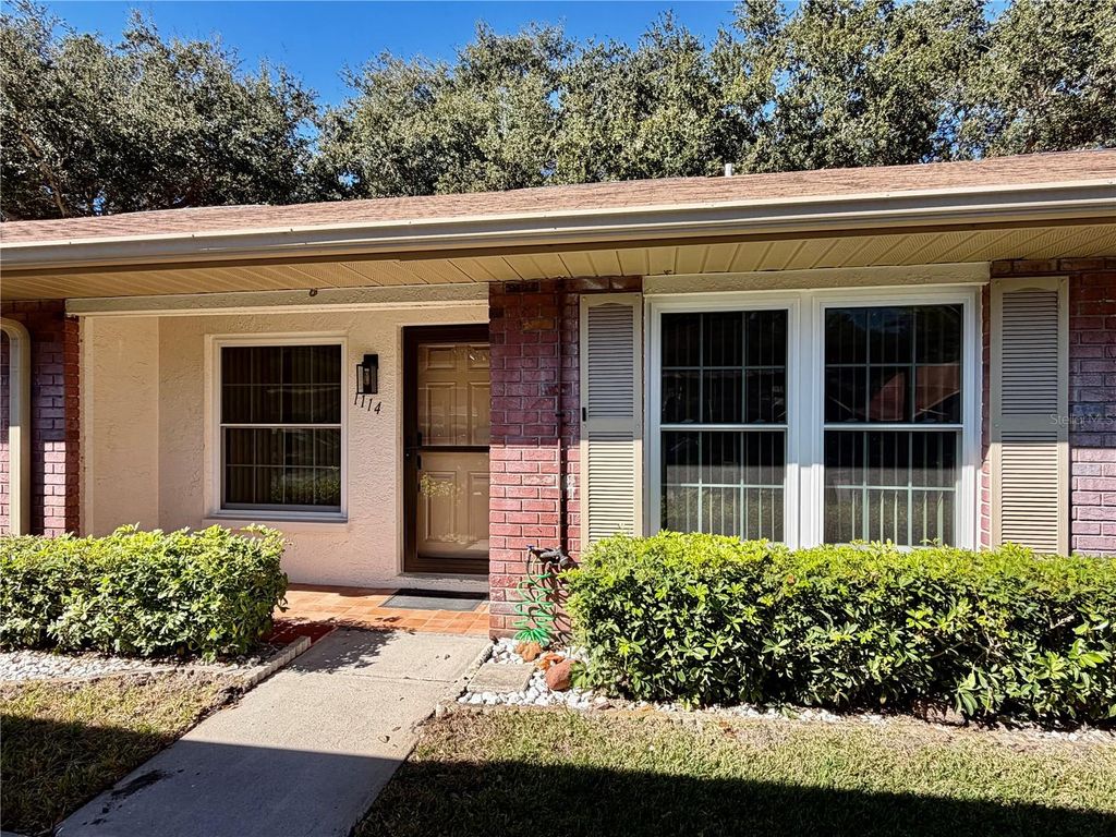 Photo of 1114 Castlemay Circle, Dunedin, FL 34698 (MLS # TB8452291)