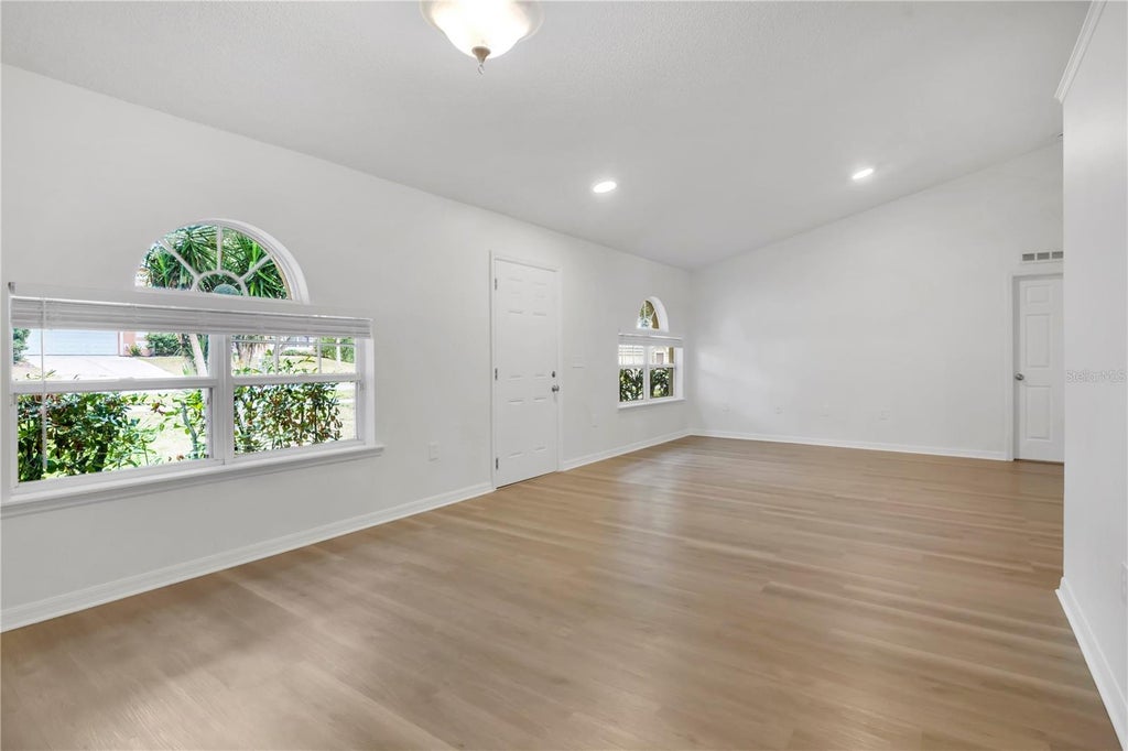 Photo of 2885 White Magnolia Loop, Clermont, FL 34711 (MLS # O6431386)