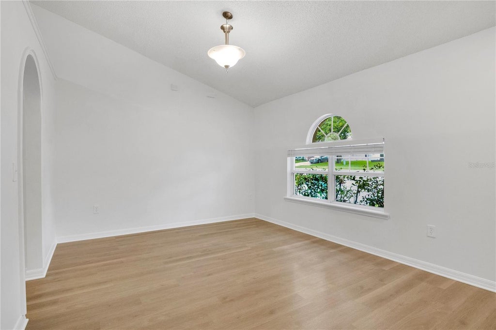Photo of 2885 White Magnolia Loop, Clermont, FL 34711 (MLS # O6431386)