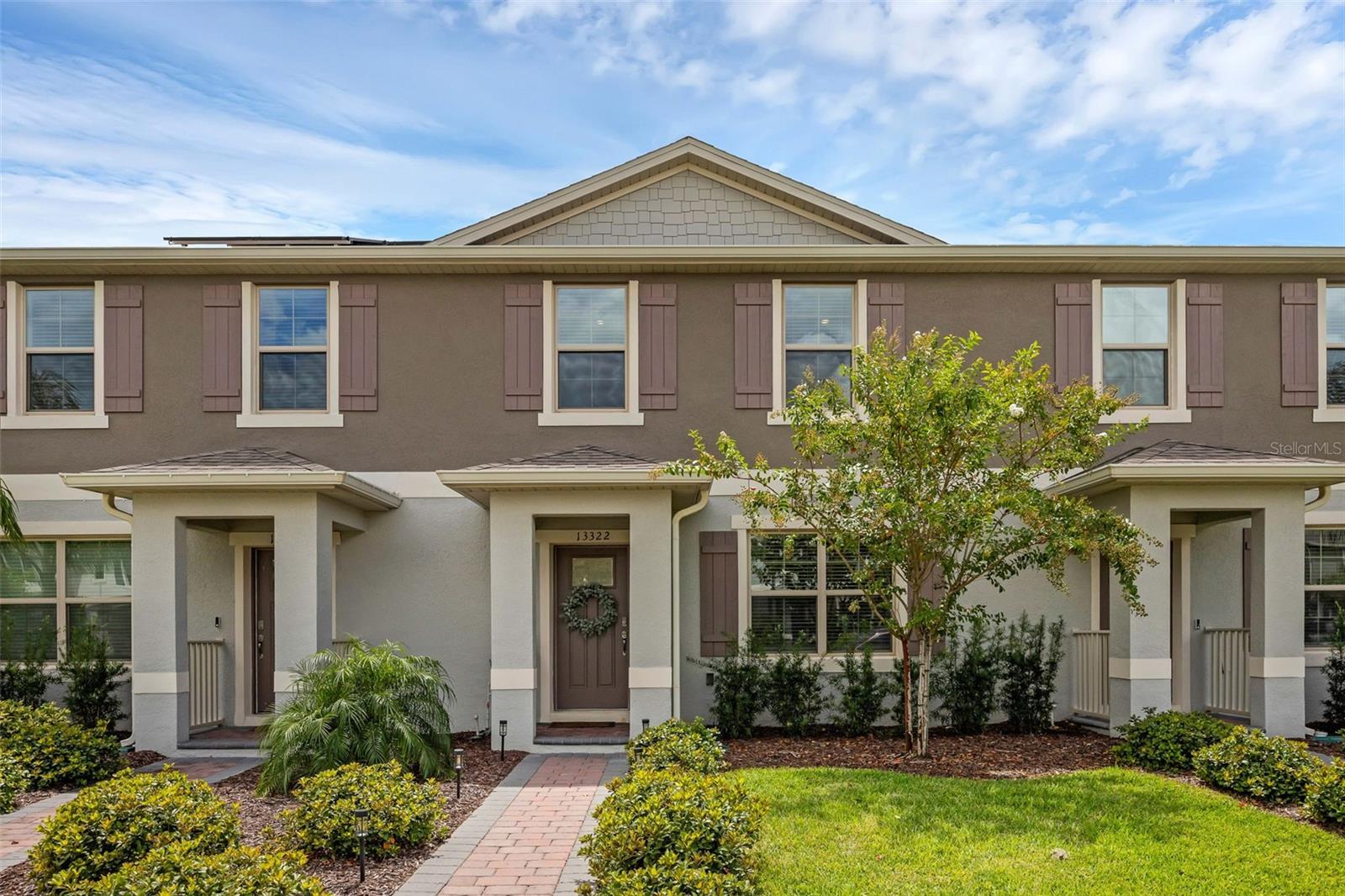 Fall in love with this stylish DR Horton “Ibis” townhome in the heart of Waterleigh! Featuring 3 bedrooms, 2.5 baths, and a bright open layout, this home blends comfort with modern design. The kitchen shines with granite counters, 36” cabinets, stainless steel Whirlpool appliances all overlooking the family room with sliders to a private brick paver patio. Upstairs, the spacious owner’s suite offers a walk-in closet and double-sink bath with glass shower, while two guest rooms share a full bath. Laundry is conveniently located upstairs. With charming details, ceramic tile floors, and plenty of natural light, this home feels warm and inviting. Located just across from Atwater Elementary, Waterleigh offers a vibrant lifestyle with three resort-style amenity centers featuring pools, parks, playgrounds, walking trails, mini golf, fitness centers, sports fields, dog parks, and more. Everyday convenience is right at your doorstep with a brand-new Publix at the community’s entrance, plus quick access to SR-429, theme parks, shopping, and dining. Move-in ready and fully equipped with all appliances plus washer & dryer! Priced to sell and ready for new owners - this is one of the Best Deals around. Don’t wait for other buyers to jump—act fast, this one will go quickly!