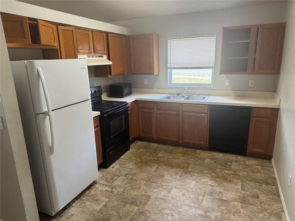 Photo of 5618 Piney Ridge Drive, Orlando, FL 32808 (MLS # O6402092)