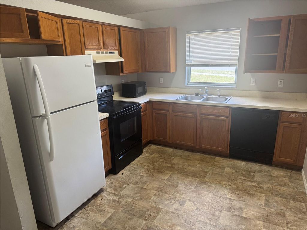 Photo of 5618 Piney Ridge Drive, Orlando, FL 32808 (MLS # O6402092)