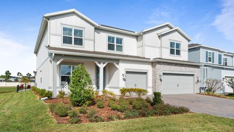 Photo of 13726 Tybee Beach Lane, Orlando, FL 32827 (MLS # O6374447)
