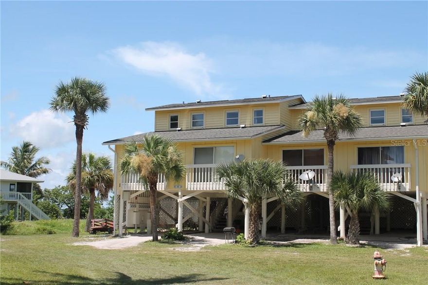 CURRENTLY UNDER RENOVATIONS FROM THE HURRICANE   Short Term Rental.  Book 3 days or 3 months!  Picture yourself enjoying this beautifully decorated island condo overlooking Placida Harbor. You are in walking distance to almost 7 miles of pristine, “Old Florida” beaches where you can search for shells or fish in the clear gulf waters for Snook, Redfish, pompano or even tarpon. You are just a boat ride away from world famous Boca Grande and nearby Charlotte Harbor. Come see what island life is like on Little Gasparilla Island and experience island living in this beautiful condo! Make your reservation today!

Accommodates 6 guests maximum.

Beds: 1 King, 2 Full.

Amenities include: Community pool, air-conditioning, outside ‘after-swim’ shower, washer/dryer, linens included, dishwasher, telephone, microwave, toaster, coffeemaker, dishes/utensils provided, TV, VCR, charcoal grill.

Extras: Wifi, Golf Cart included, Ferry service to island, convenient access to beaches and bay.

**Reservations booked for less than 5 nights constitutes a higher nightly rate**

Sorry, No Smoking. No Pets.