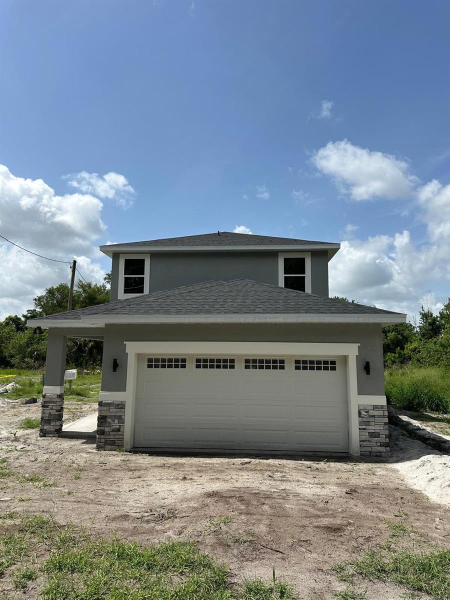 Under Construction. (Brand New Construction | No HOA | Park your RV | Extra Large Lot | STR/Airbnb-Friendly | Prime Altamonte Location | Ready by end of July 2025)
Welcome to this beautifully crafted 4-bedroom, 3.5-bathroom home located in the heart of Altamonte’s growing development corridor—just half a mile from the SunRail station and minutes to Altamonte Mall, Florida Hospital, and vibrant new restaurants.
With no HOA and short-term rental (Airbnb) allowed, this property offers flexibility for both homeowners and investors.
Step inside to find fully tiled ceramic flooring throughout, a spacious open layout with high-end finishes including quartz countertops, 42-inch cabinets, and stainless steel appliances in the gourmet kitchen. The primary suite is conveniently located on the first floor, along with a laundry room and tankless energy-efficient water heater.
Enjoy Florida living on your covered lanai, complemented by driveway pavers and a 2-car attached garage. With approximately 2,339 sqft of modern, low-maintenance design, this home is move-in ready and built for comfort and style.