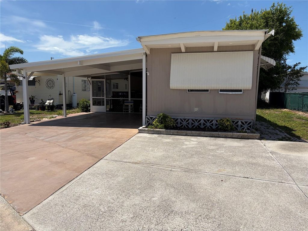 Photo of 4819 Sea Island Avenue, Sarasota, FL 34234 (MLS # A4689720)