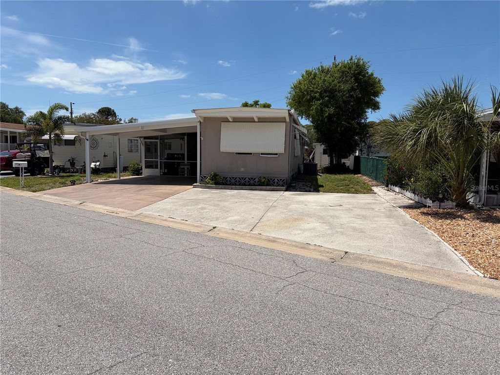 Photo of 4819 Sea Island Avenue, Sarasota, FL 34234 (MLS # A4689720)