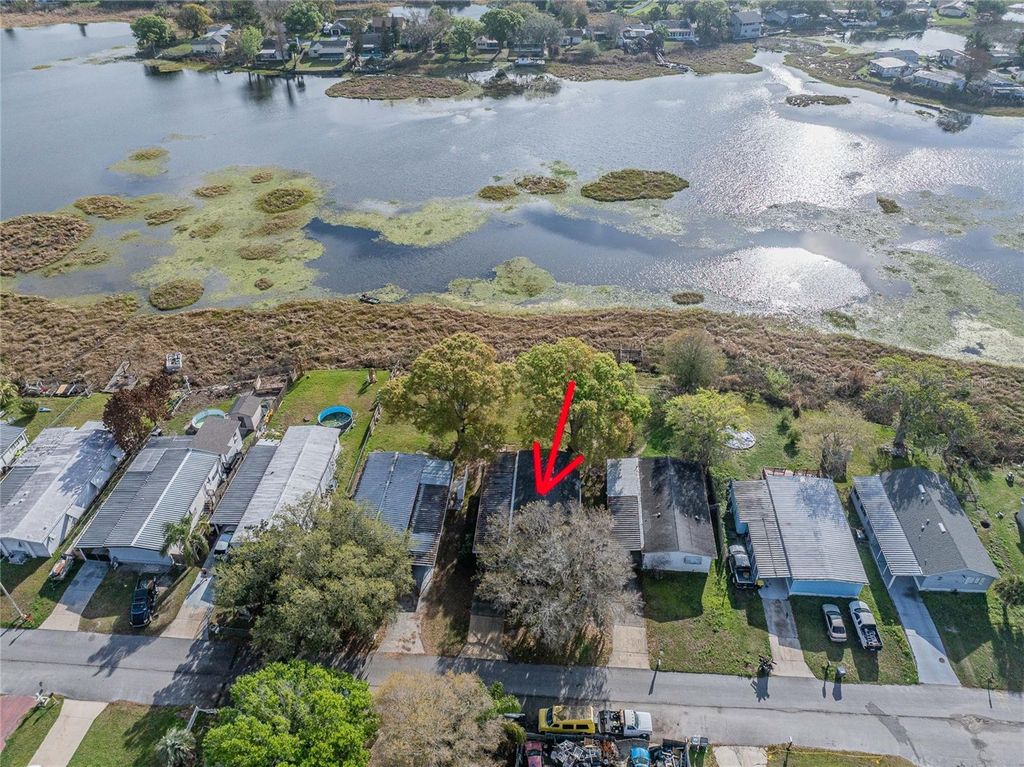 Photo of 1154 Country Club Lane, Lakeland, FL 33801 (MLS # TB8485589)