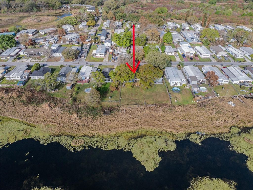 Photo of 1154 Country Club Lane, Lakeland, FL 33801 (MLS # TB8485589)