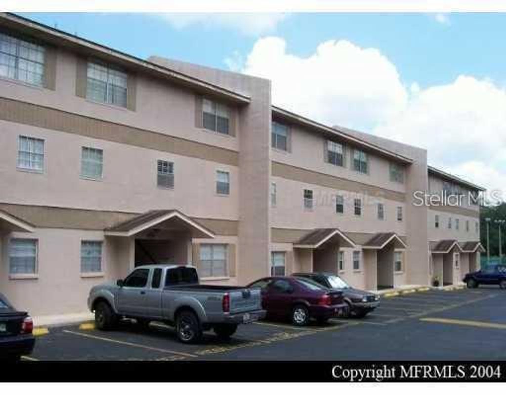 Photo of 14470 Reuter Strasse Circle #405, Tampa, FL 33613 (MLS # TB8488345)