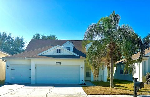 Photo of 17248 Poppy Fields Lane, Land O Lakes, FL 34638 (MLS # TB8475222)