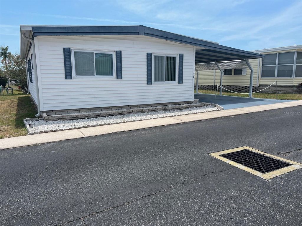 Photo of 210 Royal Palm Circle, Largo, FL 33778 (MLS # TB8378158)