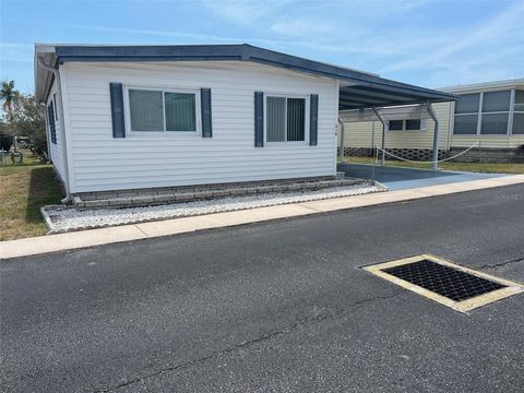 Photo of 210 Royal Palm Circle, Largo, FL 33778 (MLS # TB8378158)