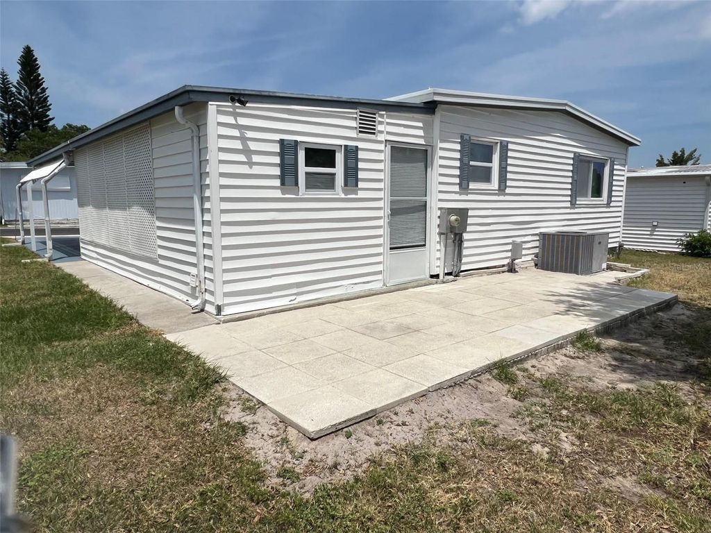 Photo of 210 Royal Palm Circle, Largo, FL 33778 (MLS # TB8378158)