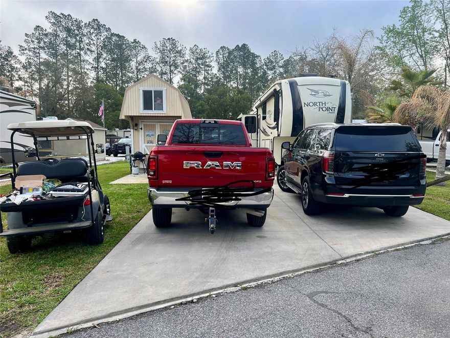 Own your piece of paradise in the highly sought-after Wilderness RV Resort in Silver Springs, Florida! This deeded 0.07 acre RV lot is located in a welcoming 55+ gated community nestled alongside the breathtaking Ocala National Forest, offering the perfect blend of nature, relaxation, and resort-style living. The lot is fully set up for comfort and convenience, featuring a large deck ideal for entertaining or enjoying Florida's beautiful weather, along with an 8x12 shed that includes a pull-down aluminum staircase leading to a spacious 8x16 loft - perfect for extra storage. Whether you're looking for full-time living, a seasonal snowbird retreat, or a great investment opportunity, this property offers incredible flexibility. Residents enjoy resort-style amenities including heated swimming pools, spa/jacuzzi, clubhouse, fitness centers, walking trails, and a vibrant community atmosphere. The affordable HOA fee includes lawn maintenance, water, and sewer, keeping ownership simple and low maintenance. Owners are responsible only for electric and propane. With the Ocala National Forest just minutes away, you'll have endless opportunities for hiking, kayaking, fishing, wildlife viewing, and exploring Florida's natural beauty. Whether you're escaping the cold winters or looking for a relaxing year-round retreat, this RV lot offers the lifestyle you've been dreaming of! Schedule your appointment today!