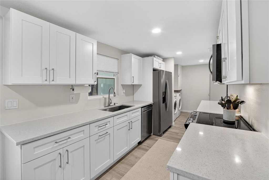 Photo of 3706 Mistwood Drive, Tampa, FL 33619 (MLS # TB8472751)