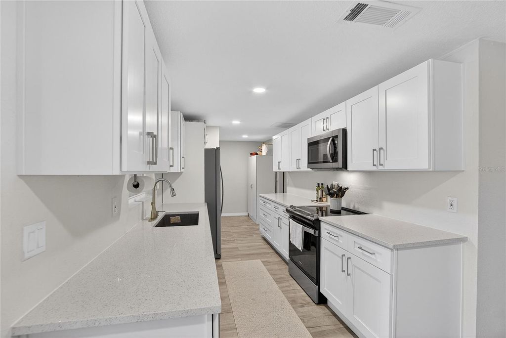 Photo of 3706 Mistwood Drive, Tampa, FL 33619 (MLS # TB8472751)