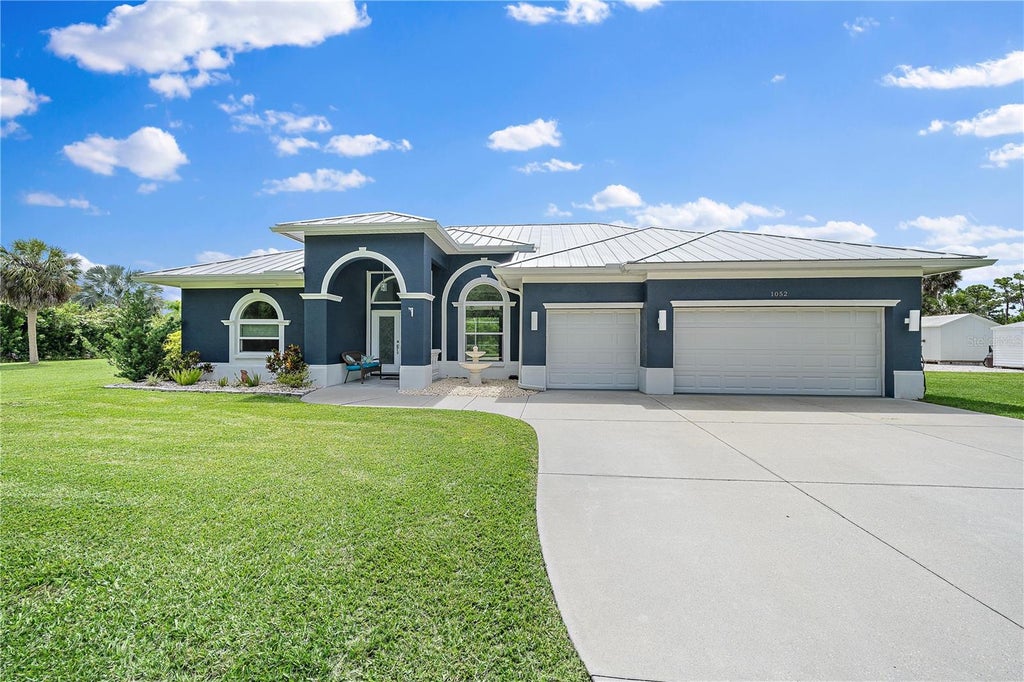 Photo of 1052 Eppinger Drive, Port Charlotte, FL 33953 (MLS # N6144637)