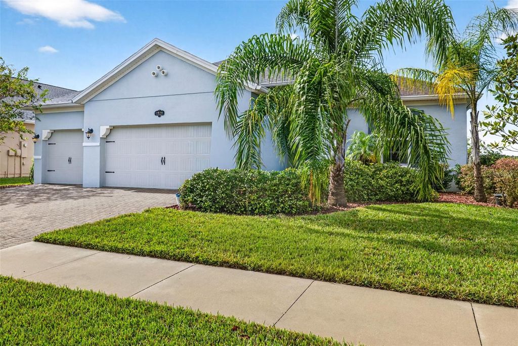Photo of 1929 Moorhen Way, Lutz, FL 33558 (MLS # TB8435832)