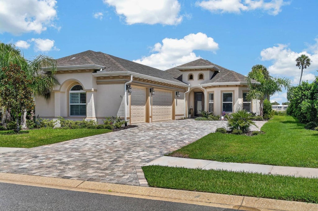 Photo of 31 S Riverwalk Drive, Palm Coast, FL 32137 (MLS # FC321320)