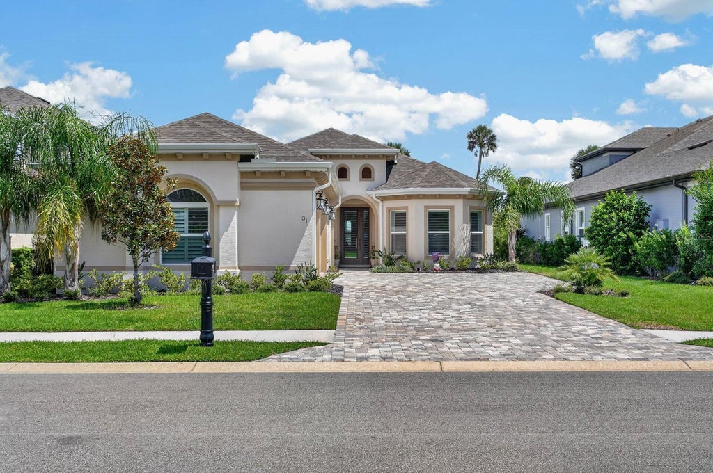 Photo of 31 S Riverwalk Drive, Palm Coast, FL 32137 (MLS # FC321320)