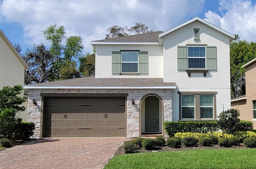 Large 5 bedroom home + large Bonus loft. This 3 year old home is in the awesome community of Lakeside just west of the Winter Garden Village
about 4 miles. The home has tons of space, humungous kitchen and Master bedroom downstairs along with bedroom #1 and full bath. The first
floor is gorgeous wood style tile from the front door, through the kitchen to the back. The Gourmet kitchen is very large with TONS of tall 42 inch
raised panel cabinetry and walk-in pantry. The beautiful light quartz counters white cream cabinets with crown molding, stainless steel fridge,
oven and microwave built in, Gas cooktop and designer vented hood, accented with tiled backsplash. Island sink with breakfast bar look out to
the open living room and dinette. Dinette has same wood style tile, and large windows on 3 sides to embrace the outside. There is a separate
dining room that can also be used as more flex space. The living room has a wide slider out to the covered lanai. Mater bedroom with high
coffered ceilings, Huge walk in Shower with bench, huge walk in closet, double vanities and separate toilet room and linen closet. Next to the
garage is the large laundry room. At the top of the stairs is a huge open loft with lots of windows, bedrooms, 3,4, and 5, and large bath with
dual sink room separated from toilet and tub for greater use. This Harper Floor plan from Cal Atlantic Homes is located in the awesome
community of Waterside at Johns lake, with an incredible huge pool lakeside, clubhouse, state-of-the-art fitness center, will make you feel like
your on vacation. The lakes have walking paths, benches and picnic tables. Located just a few minutes from Winter Garden Village and the 429
and turnpike.